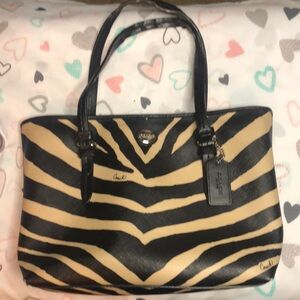 COACH Peyton black and tan zebra print top handle tote. Style # F52532.